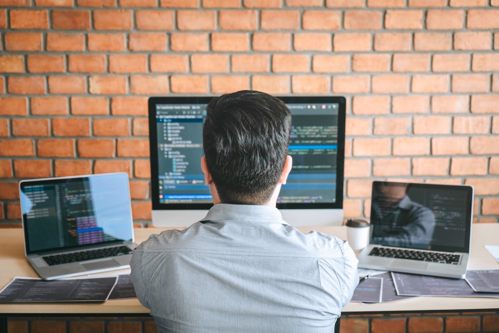 Professional Developer programmer working a software website design and coding technology, writing codes and database in company office, Global cyber connection technology